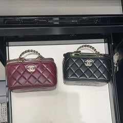 Black and Maroon Chanel vanity medium clutch with chain