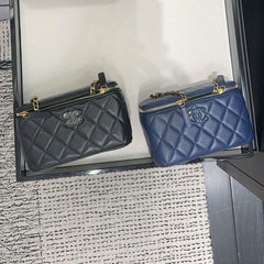 Black and Navy Chanel vanity medium clutch with chain